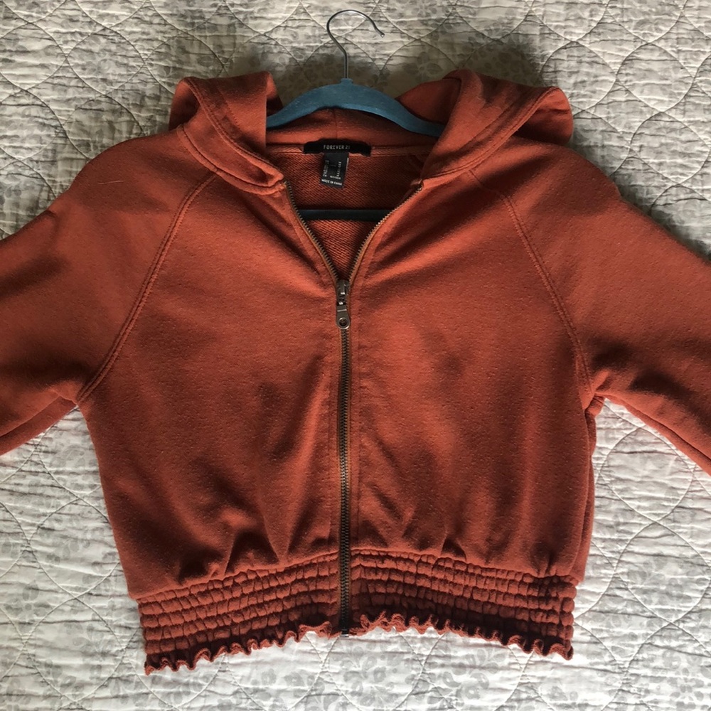 This is a Forever 21 medium sized cardigan.
